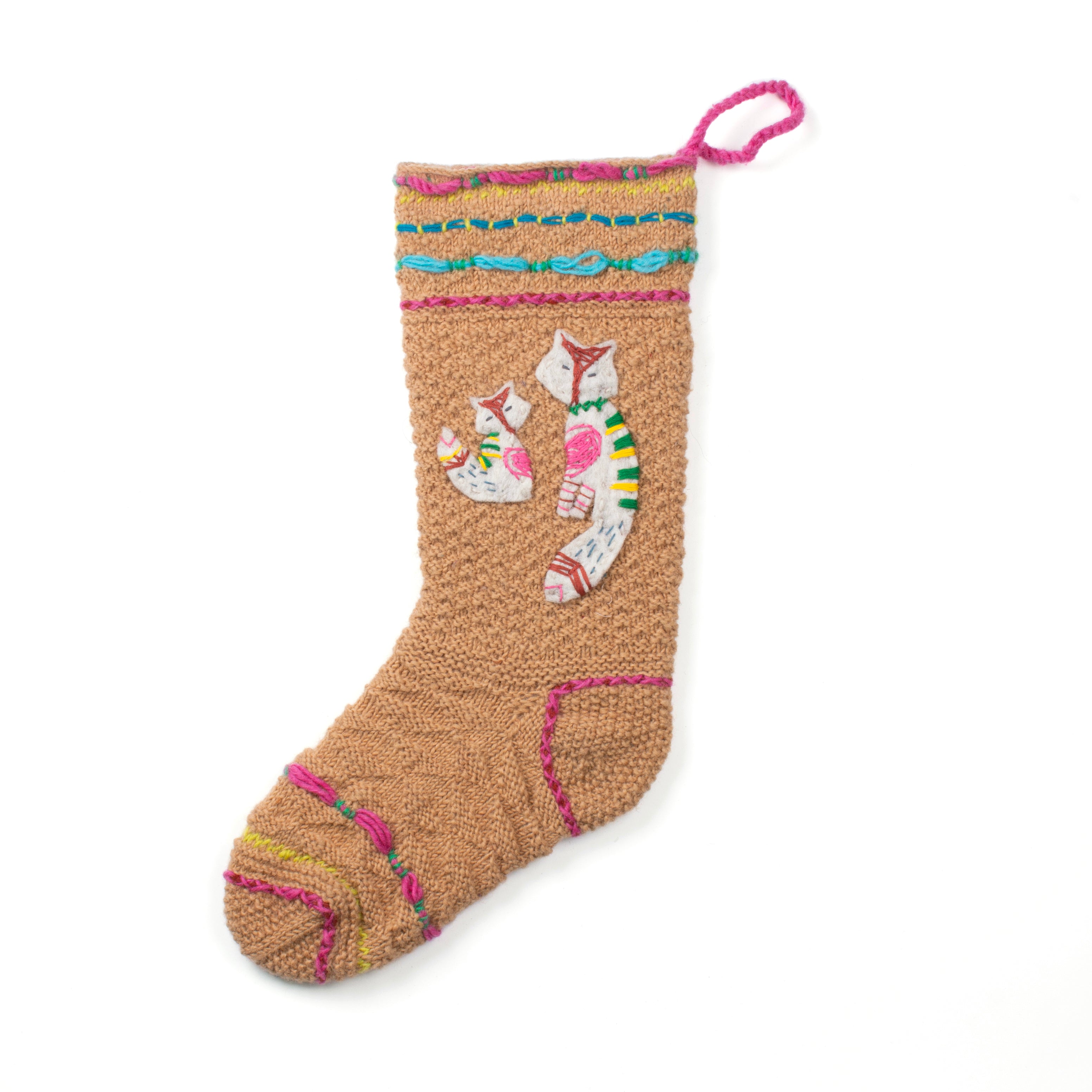 Hand-knit wool Christmas stocking with felt fox and kit motif, handmade in Nepal, Fair Trade.